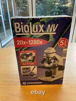 Microscope BRESSER Biolux NV 20x-1280x avec accessoires de caméra USB et sac de transport.